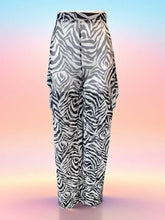 Outstanding Sheer Cover-Up Pants with zebra print, perfect for summer outings and beach days.
